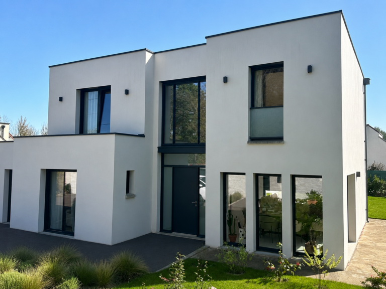 Photo façade arrière maison à étage de 146m² avec toit plat